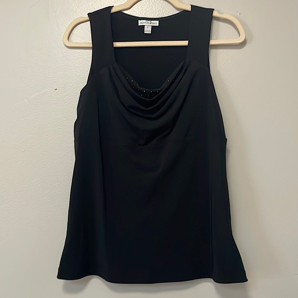 Pretty sleeveless blouse with silver embezzlements. Size small